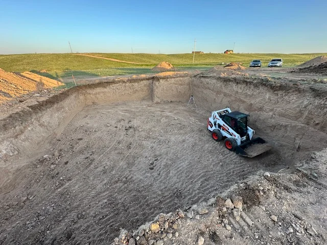 Residential excavation site prep with skid steer, Laramie County Wyoming